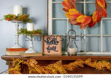 Hello fall sign and cozy autumn decorations for the home