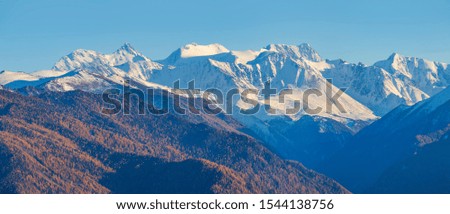 View of Belukha Mountain - the main peak of Altai. Traveling in the mountains, climbing.