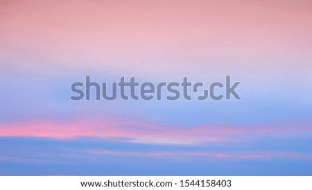 The pink blue sky with clouds at sunset