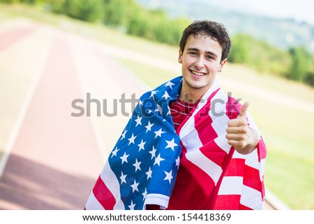 American Athlete with National Flag Royalty-Free Stock Photo #154418369