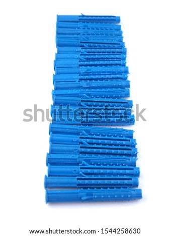 blue dowels on a white background