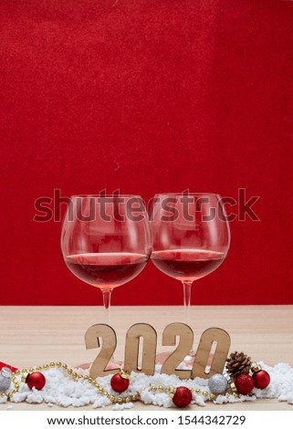 Merry New Year 2020 Christmas with celebration decorations red background, minimal copy space for text