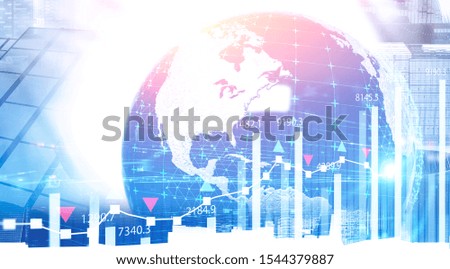 Global world trade and financial market concept. Planet hologram in city with double exposure of graphs. Toned image. Elements of this image furnished by NASA