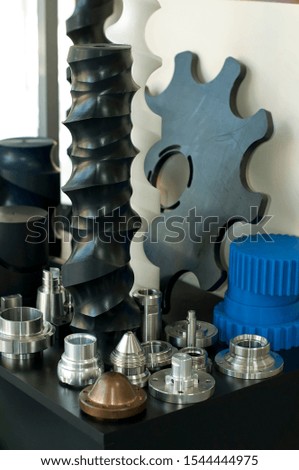 Plastic and metal machine parts. Industry concept.