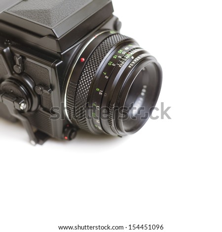 Close up of a professional medium format film camera system isolated on white. 