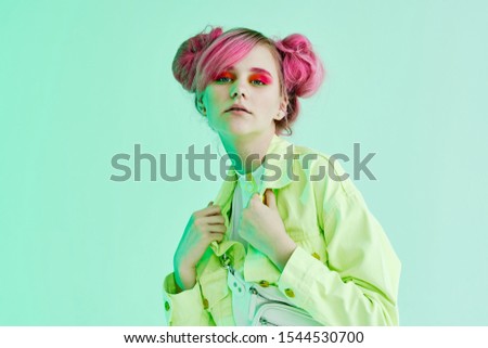 young woman looking at the camera isolated background