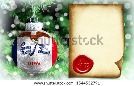 Christmas and New Year background with a flag State of Iowa. There is a place for your text in the photo