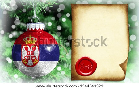 Christmas and New Year background with a flag of Serbia. There is a place for your text in the photo
