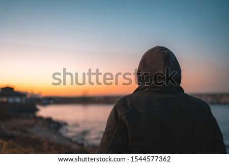 Man is watching the sunset