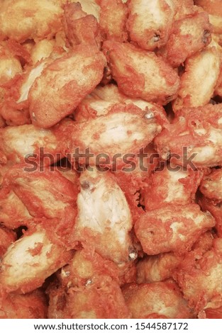 Fried chicken wings as a vertical picture background 