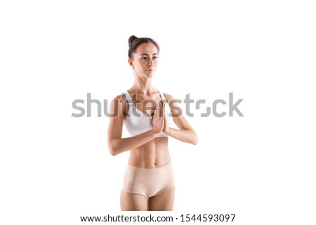 Woman meditating in isolated on white background. Yoga exercise.
