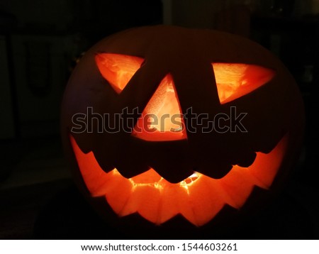 Jack O Lantern pumpkin in the dark for Halloween 