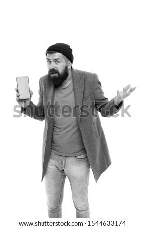 Internet surfing social networks with smartphone. Man with smartphone. Modern life demands modern gadgets. Mobile dependence concept. Mobile phone always with me. Hipster bearded man use smartphone.