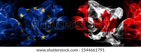 Eu, European union vs Canada, Canadian smoke flags placed side by side. Thick colored silky smokes abstract flags 