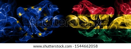 Eu, European union vs Ghana, Ghanaian smoke flags placed side by side. Thick colored silky smokes abstract flags 