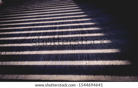 Grungy concrete wall textured background with shadow lines