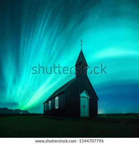 Aurora borealis at Budir church, Iceland.