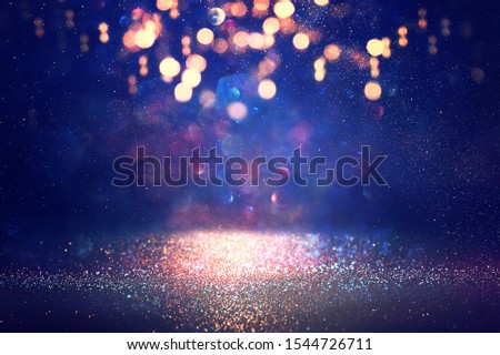 abstract glitter silver, gold , blue lights background. de-focused