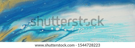 art photography of abstract marbleized effect background. white, blue and gold creative colors. Beautiful paint. banner