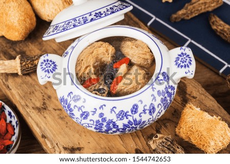 Hericium mushroom black chicken stew, Chinese cuisine