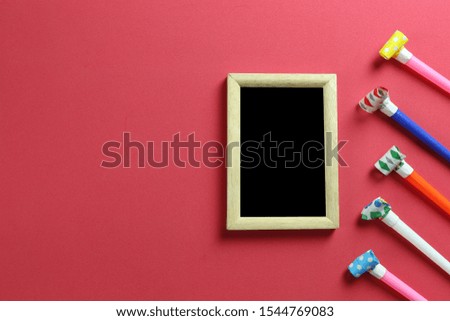 Christmas decoration and wooden frame on red art paper background and have copy space in Christmas and New Year concept.