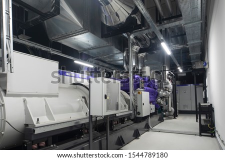 Generator. Diesel and gas industrial electric generator. Royalty-Free Stock Photo #1544789180