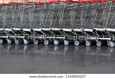 The empty shopping carts were collected and kept at park lot of the mall.