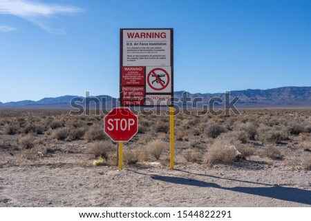 Hiko, Nevada - October 21, 2019: Replica of the U.S. Air Force Installation signs that surround area 51. These replicas are at the Alien Research Center on Nevada State Rt. 375. Royalty-Free Stock Photo #1544822291