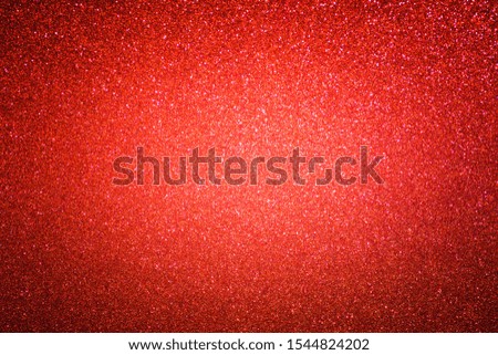 Abstract blurred gradient deep red black silver shiny glitter Valentine’s Day texture background. 
Gradation foil paper color red light sparkle Chinese New Year background.
 top view.