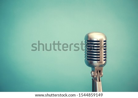 retro microphone, light blue background