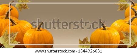 This is a picture of pumpkin and dried leaves with the Thanksgiving atmosphere