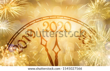 New Year concept, clock near to the midnight of 2020, fireworks golden bokeh background Royalty-Free Stock Photo #1545027566