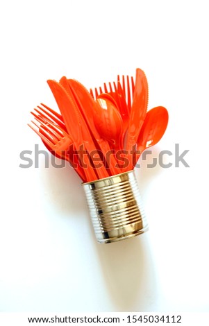 A studio photo of plastic cutlery