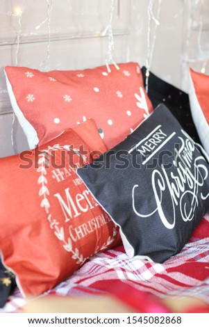 pillows with the inscription merry christmas