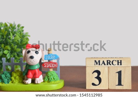 The dog in the garden, Date of number cube design, March 31.