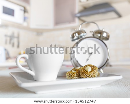Cup of coffee in a kitchen.