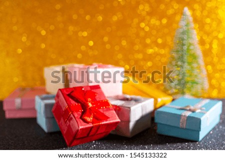 Christmas tree and gift box. Festive christmas background.