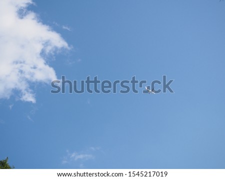 a airplane in sky with cloud