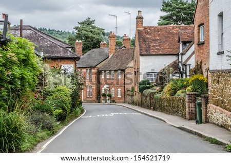 Road going into Shere Village Surrey UK Royalty-Free Stock Photo #154521719