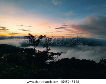 Picture of umiam lake surrounded by clouds