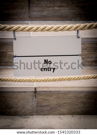 No entry sing. Mininalist information symbol on ropes saying not to pass.