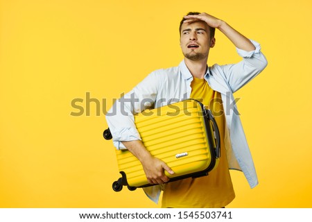 Yellow suitcase man goes on a trip isolated background