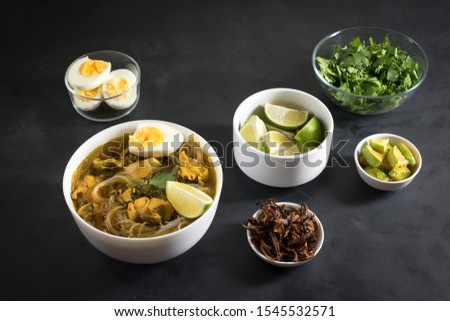 Spicy Burmese fish soup or Myanmar's gastronomic variety. Royalty-Free Stock Photo #1545532571