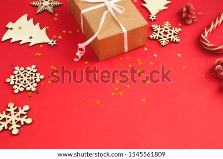 Flat lay composition. Christmas accessories and decorations on red background. top view, copy space