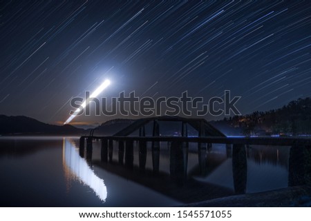 Starry sky, Diurnal motion of stars. Royalty-Free Stock Photo #1545571055