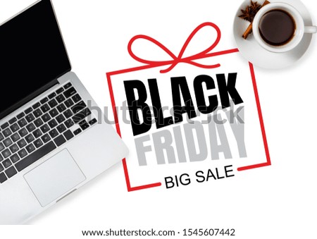 Top view of laptop and cup of tea with black friday lettering on white background. Copyspace for your advertising. Black friday, sales, finance, advertising, money, finance, purchases concept.