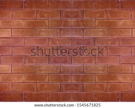 Red interlocking bricks are a component of building a house for decorating. Can be used to design as a background.