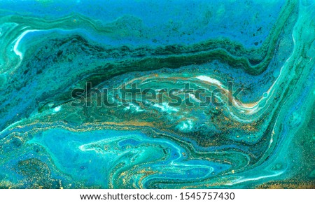 Blue and gold marbling ripple of agate. Royalty-Free Stock Photo #1545757430