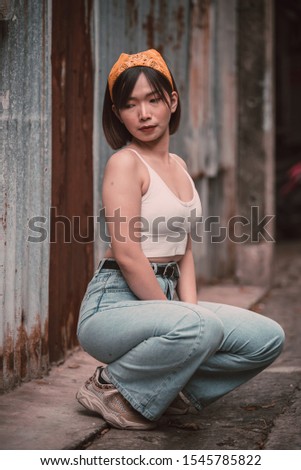 Portrait of asian hipsters girl pose for take a picture,Lifestyle of teen thailand people