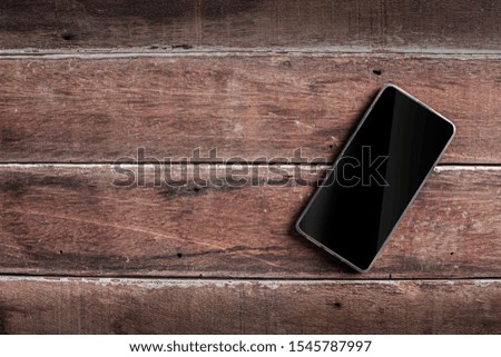 Smartphone mobile on wood table
